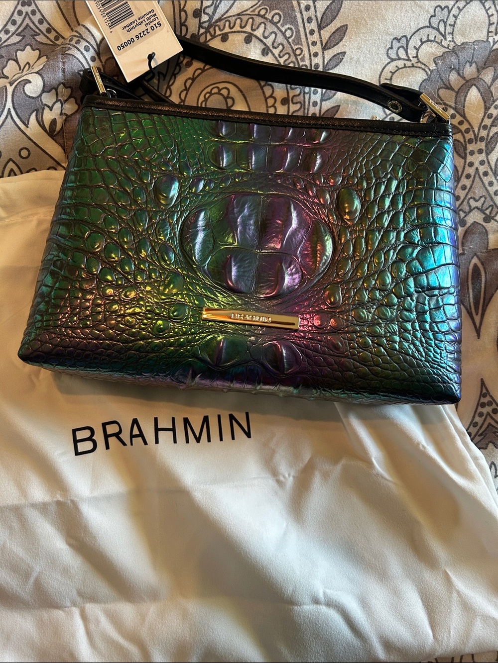 Brahmin Iridescent Croc-Embossed Wristlet in Green and Purple